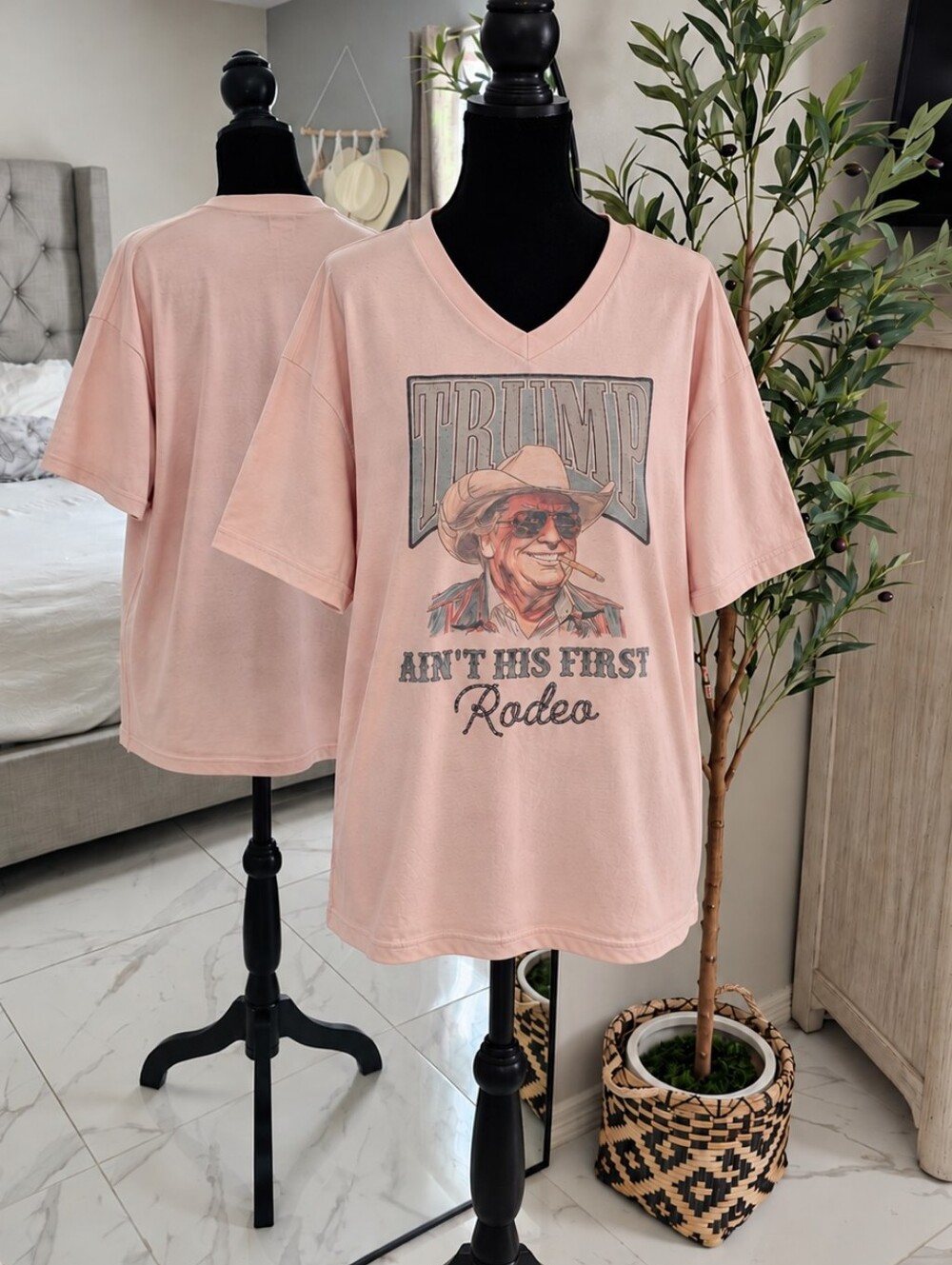 Vintage-Style Pink V-Neck Graphic Tee - Trump Ain't His First Rodeo